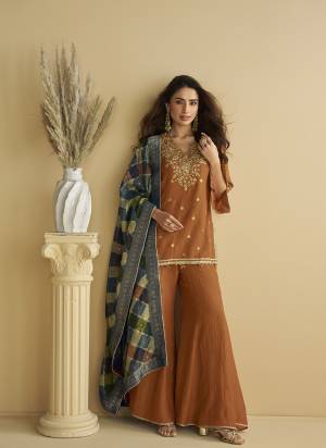 Looking These Fancy Party Wear Free Size Stitched Plazzo Suit in Fine Colored Pair.These Top And Bottom Are Chinon And Pair With Chinon Dupatta Fabric.Its Beautified With Heavy Designer Embroidery Work.