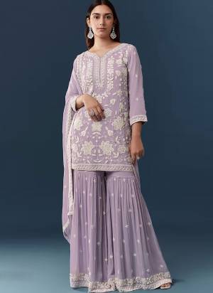 Attractive These Party Wear Designer Sharara Suit in Fine Colored.These Top Are Georgette And Dupatta Are Fabricated On Georgette Pair With Georgette Bottom.Its Beautified With Santoon Inner.Its Beautified With Heavy Designer Embroidery Work.