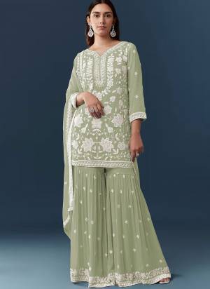 Attractive These Party Wear Designer Sharara Suit in Fine Colored.These Top Are Georgette And Dupatta Are Fabricated On Georgette Pair With Georgette Bottom.Its Beautified With Santoon Inner.Its Beautified With Heavy Designer Embroidery Work.
