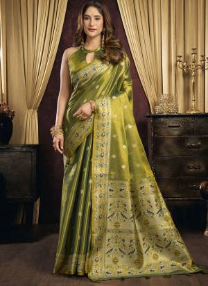 Garb These Fancy Party Wear Saree in Fine Colored.These Saree Are Tissue Silk And Blouse is Tissue Silk Fabricated.Its Beautified With Woven Designer.