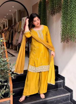 Garb These Beautiful Looking Readymade Suits.These Top Are Kajo Silk And Bottom Are Kajo Silk And Naznin Dupatta Fabricated.Its Beautified  With Disigner Embroidery Work.