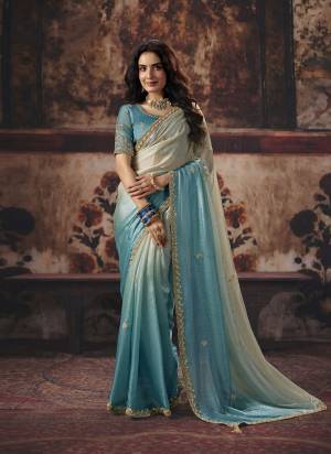 Looking These Fancy Party And Fastival Wear Saree in Fine Colored.These Saree Are Fendy Satin And Blouse is Fabricated On Fendy Satin.Its Beautified With DesignerMotif Crystal Beads,Sequance Hand Work.