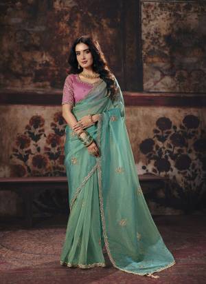 Looking These Fancy Party And Fastival Wear Saree in Fine Colored.These Saree Are Organza And Blouse is Fabricated On Benglori Silk.Its Beautified With DesignerMotif Crystal Beads,Sequance Hand Work.