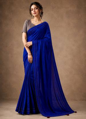 Garb These Party Wear Saree in Fine Colored.These Saree Are Tissue And Blouse is Tissue Fabricated.Its Beautified With Woven Solid Designer.