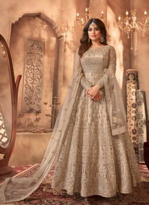 Garb These Party Wear Designer Anarkali Suit in Fine Colored Pair With Bottom And Dupatta.These Top Are Net And Dupatta Are Fabricated On Net Pair With Santoon Bottom.Its Beautified With Satin Inner.Its Beautified With Heavy Designer Embroidery Work.
