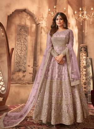 Garb These Party Wear Designer Anarkali Suit in Fine Colored Pair With Bottom And Dupatta.These Top Are Net And Dupatta Are Fabricated On Net Pair With Santoon Bottom.Its Beautified With Satin Inner.Its Beautified With Heavy Designer Embroidery Work.