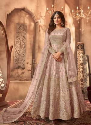 Garb These Party Wear Designer Anarkali Suit in Fine Colored Pair With Bottom And Dupatta.These Top Are Net And Dupatta Are Fabricated On Net Pair With Santoon Bottom.Its Beautified With Satin Inner.Its Beautified With Heavy Designer Embroidery Work.