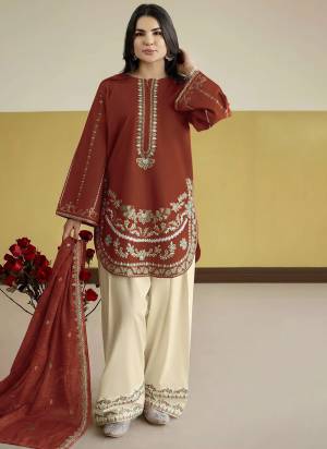 Garb These Designer Suit in Fine Colored Pair With Bottom And Dupatta.These Top Are Roman Silk And Dupatta Are Fabricated On Roman Silk Pair With Silk Bottom.Its Beautified With Silk Inner.Its Beautified With Heavy Designer Embroidery Work.