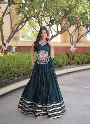 Looking These Beautiful Looking Navratri Wear Free Size Stitched Lahenga Choli.These Lahenga Are Rayon And Blouse is Fabricated On Rayon.Its Beautified With Designer Mukesh,Gamthi Mirror Work.