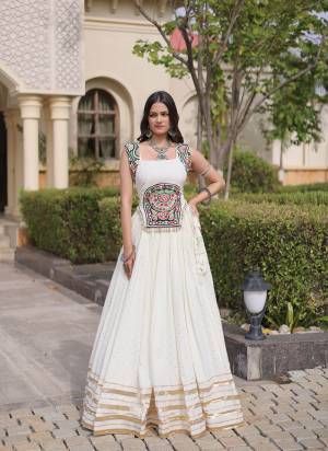 Looking These Beautiful Looking Navratri Wear Free Size Stitched Lahenga Choli.These Lahenga Are Rayon And Blouse is Fabricated On Rayon.Its Beautified With Designer Mukesh,Gamthi Mirror Work.
