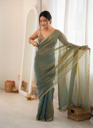 Looking These Fancy Party Wear Saree in Fine Colored.These Saree Are Moss Butti And Blouse is Moss Butti Fabricated.Its Beautified With Heavy Woven Butti Designer With Embroidery Cut Work.