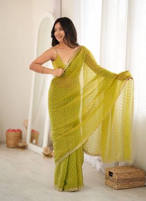 Looking These Fancy Party Wear Saree in Fine Colored.These Saree Are Moss Butti And Blouse is Moss Butti Fabricated.Its Beautified With Heavy Woven Butti Designer With Embroidery Cut Work.