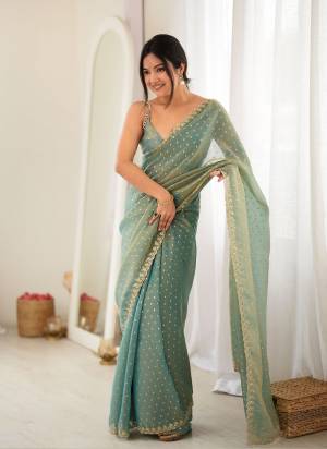 Looking These Fancy Party Wear Saree in Fine Colored.These Saree Are Moss Butti And Blouse is Moss Butti Fabricated.Its Beautified With Heavy Woven Butti Designer With Embroidery Cut Work.