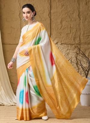 Looking These Party Wear Ready To Wear Saree in Fine Colored.These Saree Are Satin And Blouse is Satin Fabricated.Its Beautified With Designer Bandhani Printed.
