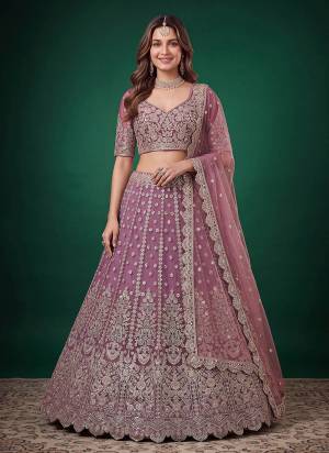 For A Designer Look,Grab These Lehenga Choli in Fine Colored.These Lehenga And Blouse Are Fabricated On Soft Net Pair With Dupatta Are Net.Its Beautified With Dori,Jari,Multyple Sequance Embroidery Work.