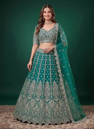 For A Designer Look,Grab These Lehenga Choli in Fine Colored.These Lehenga And Blouse Are Fabricated On Soft Net Pair With Dupatta Are Net.Its Beautified With Dori,Jari,Multyple Sequance Embroidery Work.