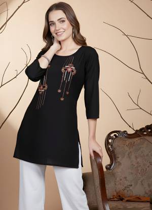 Looking These Beautiful Looking Readymade Short Tunic Top.These Top is Fabricated On Rayon.Its Beautified With Designer Hand Work.