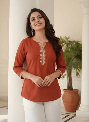 Looking These Beautiful Looking Readymade Short Tunic Top.These Top is Fabricated On Roman Silk.Its Beautified With Designer Embroidery Work.