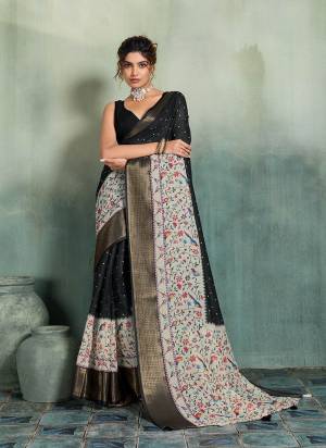 Garb This Party Wear Saree Paired With Blouse.This Saree Are Linen And Blouse Are Linen Fabric With Woven Jari Border Designer With Printed. Buy This Pretty Saree Now.