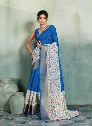 Garb This Party Wear Saree Paired With Blouse.This Saree Are Linen And Blouse Are Linen Fabric With Woven Jari Border Designer With Printed. Buy This Pretty Saree Now.