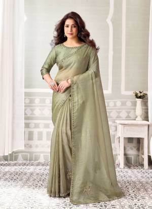 Look Attrective These Designer Party Wear Saree in Fine Colored.These Saree Are Zari organza Satin Silk And Blouse Satin Silk is Fabricated.Its Beautified Desiger Embroidery,Pearl,Stone Work.