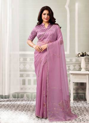Look Attrective These Designer Party Wear Saree in Fine Colored.These Saree Are Organza Tissue And Blouse Silk Brocade is Fabricated.Its Beautified Desiger Embroidery,Pearl,Stone Work.