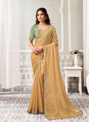 Look Attrective These Designer Party Wear Saree in Fine Colored.These Saree Are Georgette Butti And Blouse Satin Silk is Fabricated.Its Beautified Desiger Embroidery,Pearl,Stone Work.