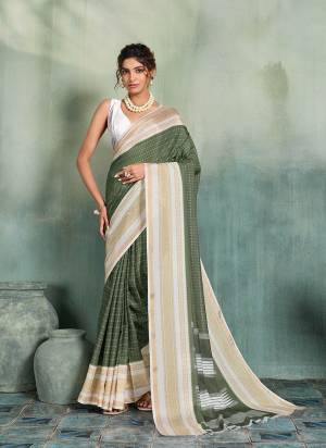 Looking This Party Wear Saree Paired With Blouse.This Saree Are Mul Cotton And Blouse Are Mul Cotton Fabric With Woven Designer With Printed. Buy This Pretty Saree Now.