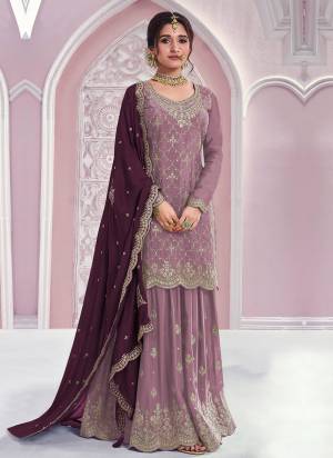 Garb These Fancy Designer Plazzo Suit in Fine Colored Pair With Bottom And Dupatta.These Top Are Chinon And Dupatta Are Fabricated On Chinon Pair With Chinon Bottom.Its Beautified With Santoon Inner.Its Beautified With Heavy Designer Embroidery Work.