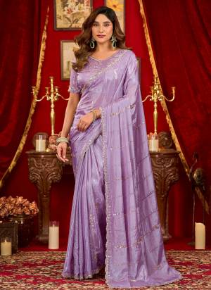 Looking These Fancy Party Wear Saree in Fine Colored.These Saree Are Prada Silk And Blouse is Prada Silk Fabricated.Its Beautified With Designer Beads,Sequance Work.