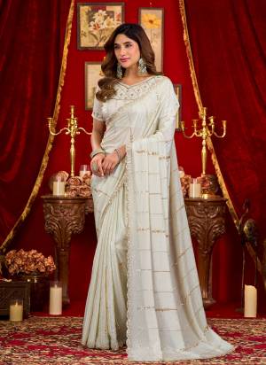 Looking These Fancy Party Wear Saree in Fine Colored.These Saree Are Prada Silk And Blouse is Prada Silk Fabricated.Its Beautified With Designer Beads,Sequance Work.