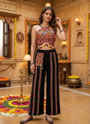 Attactive These Designer Navratri Ready Made Dress in Fine Colored.These Top Are Ribbed And Bottom Are Fabricated On Ribbed Pair.Its Beautified With Designer Kutchi Mirror Embroidery Work.
