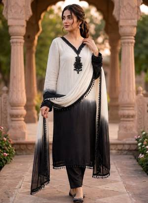 Garb These Suit in Fine Colored Pair With Bottom And Dupatta.These Top Are Crepe Silk And Bottom Are Fabricated On Frenchy Crepe Pair With Georgette Dupatta.Its Beautified With Designer Beads Moti Embroidery Work.