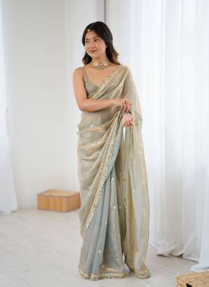 Attractive These Fancy Party Wear Saree in Fine Colored.These Saree Are Fendy Satin And Blouse is Fendy Satin Fabricated.Its Beautified With Designer Jari,Sequance Embroidery Work.