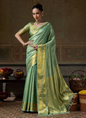Garb These Fastive And Party Wear Saree in Fine Colored.These Saree And Blouse is Fabricated On Kanchivaram Silk.Its Beautified With Weaving Jari Designer.