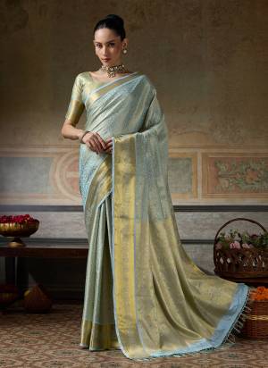 Garb These Fastive And Party Wear Saree in Fine Colored.These Saree And Blouse is Fabricated On Kanchivaram Silk.Its Beautified With Weaving Jari Designer.
