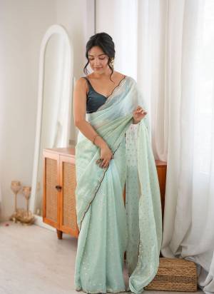 Looking These Fancy Party Wear Saree in Fine Two None Colored.These Saree Are Fendy Satin And Blouse is Ultra Satin Fabricated.Its Beautified With Two Tone Color With Woven Butti Designer,Beads Cut Dana Work.