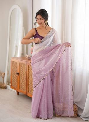 Looking These Fancy Party Wear Saree in Fine Two None Colored.These Saree Are Fendy Satin And Blouse is Ultra Satin Fabricated.Its Beautified With Two Tone Color With Woven Butti Designer,Beads Cut Dana Work.