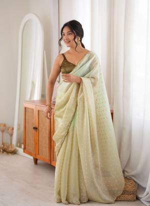 Looking These Fancy Party Wear Saree in Fine Two None Colored.These Saree Are Fendy Satin And Blouse is Ultra Satin Fabricated.Its Beautified With Two Tone Color With Woven Butti Designer,Beads Cut Dana Work.
