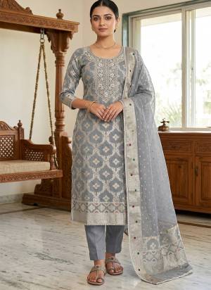 Looking These Suit in Fine Colored Pair With Bottom And Dupatta.These Top Are Banarasi Cotton And Dupatta Are Fabricated On Organza Jacquard Pair With Dul Santoon Bottom.Its Beautified With Woven Designer, Hand Work.
