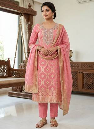 Looking These Suit in Fine Colored Pair With Bottom And Dupatta.These Top Are Banarasi Cotton And Dupatta Are Fabricated On Organza Jacquard Pair With Dul Santoon Bottom.Its Beautified With Woven Designer, Hand Work.