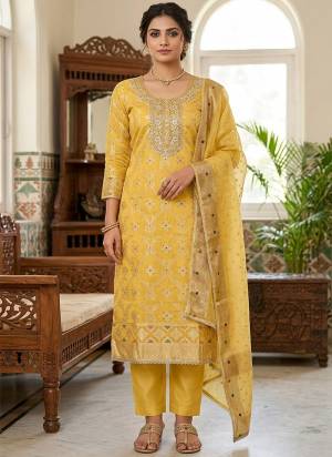 Looking These Suit in Fine Colored Pair With Bottom And Dupatta.These Top Are Banarasi Cotton And Dupatta Are Fabricated On Organza Jacquard Pair With Dul Santoon Bottom.Its Beautified With Woven Designer, Hand Work.