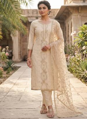 Looking These Suit in Fine Colored Pair With Bottom And Dupatta.These Top Are PV Chanderi And Dupatta Are Fabricated On Nazmin Pair With Rayon Bottom.Its Beautified With Designer Embroidery, Hand Work.
