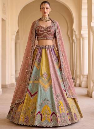 For A Fancy Designer Look,Grab These Lehenga Choli With Dupatta in Fine Colored.These Lehenga And Choli Are Silk And Dupatta Are Fabricated On Georgette Pair.Its Beautified With Thread,Jari,Sequance Embroidery,Motif Hand Work. 