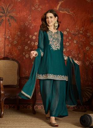Garb These Prty Wear Plazzo Suit in Fine Colored Pair With Bottom And Dupatta.These Top Are Silk And Bottom Are Fabricated On Silk Pair With Silk Dupatta.Its Beautified With Designer Embroidery Work.