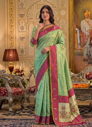 Garb These Fastive And Party Wear Saree in Fine Colored.These Saree And Blouse is Fabricated On Tissue Silk.Its Beautified With Weaving Jacquard Designer.