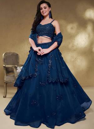 For A Designer Look,Grab These Lehenga Choli in Fine Colored.These Lehenga And Blouse Are Fabricated On Georgette Pair With Dupatta Are Georgette.Its Beautified With Sequance,Jari,Dori Embroidery Work.