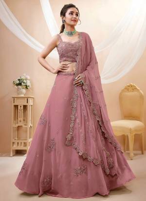 For A Designer Look,Grab These Lehenga Choli in Fine Colored.These Lehenga And Blouse Are Fabricated On Georgette Pair With Dupatta Are Georgette.Its Beautified With Sequance,Jari,Dori Embroidery Work.