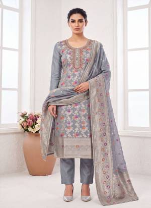 Grab These Suit in Fine Colored Pair With Bottom And Dupatta.These Top Are Banarasi Cotton And Dupatta Are Fabricated On Banarasi Jacquard Pair With Dull Santoon Bottom.Its Beautified With Woven Designer, Hand Work.