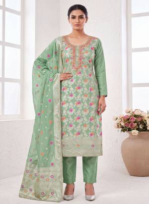 Grab These Suit in Fine Colored Pair With Bottom And Dupatta.These Top Are Banarasi Cotton And Dupatta Are Fabricated On Banarasi Jacquard Pair With Dull Santoon Bottom.Its Beautified With Woven Designer, Hand Work.